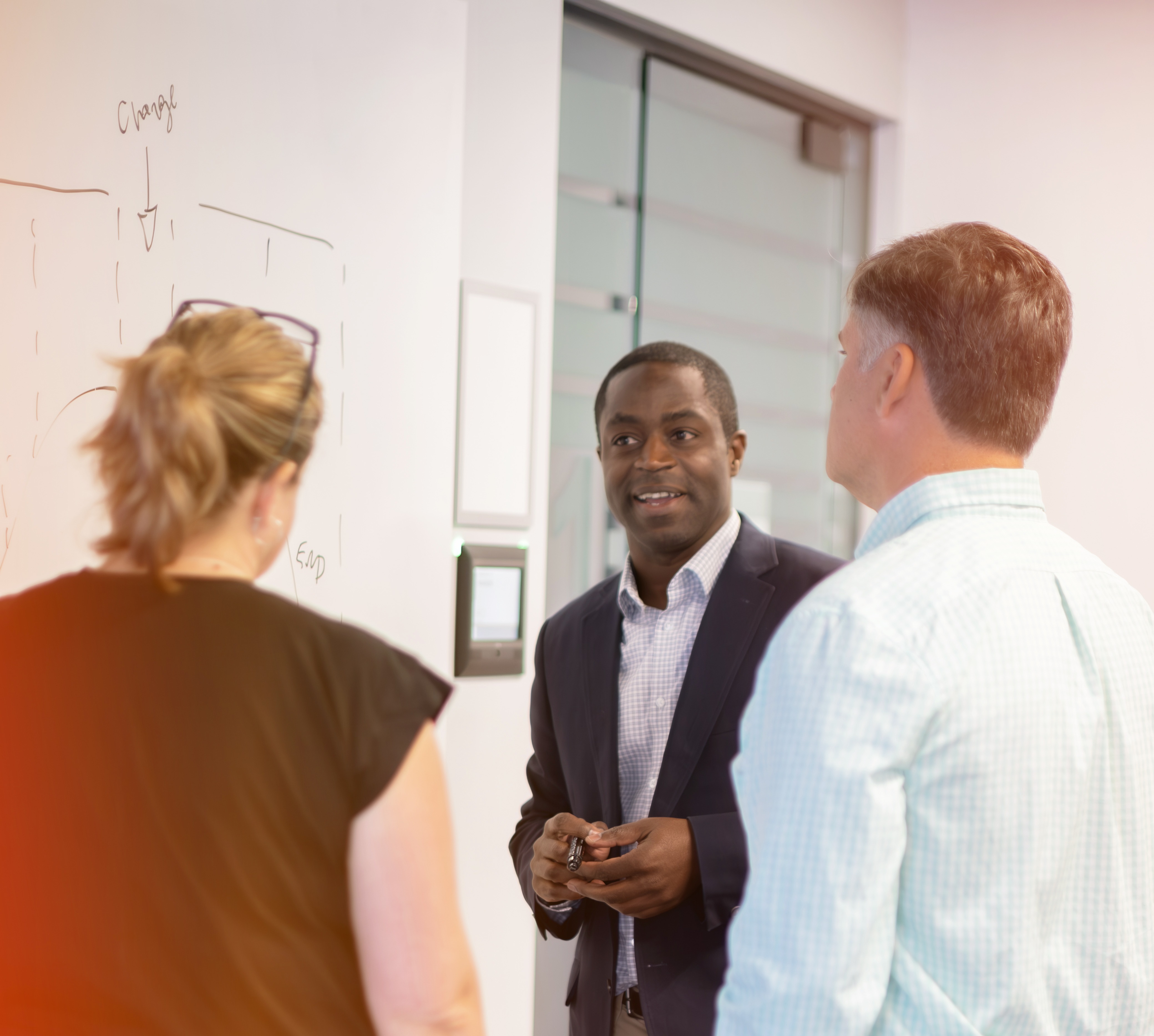 Three Colleagues in Discussion